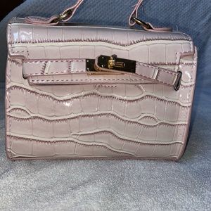 Faux pink crocodile purse